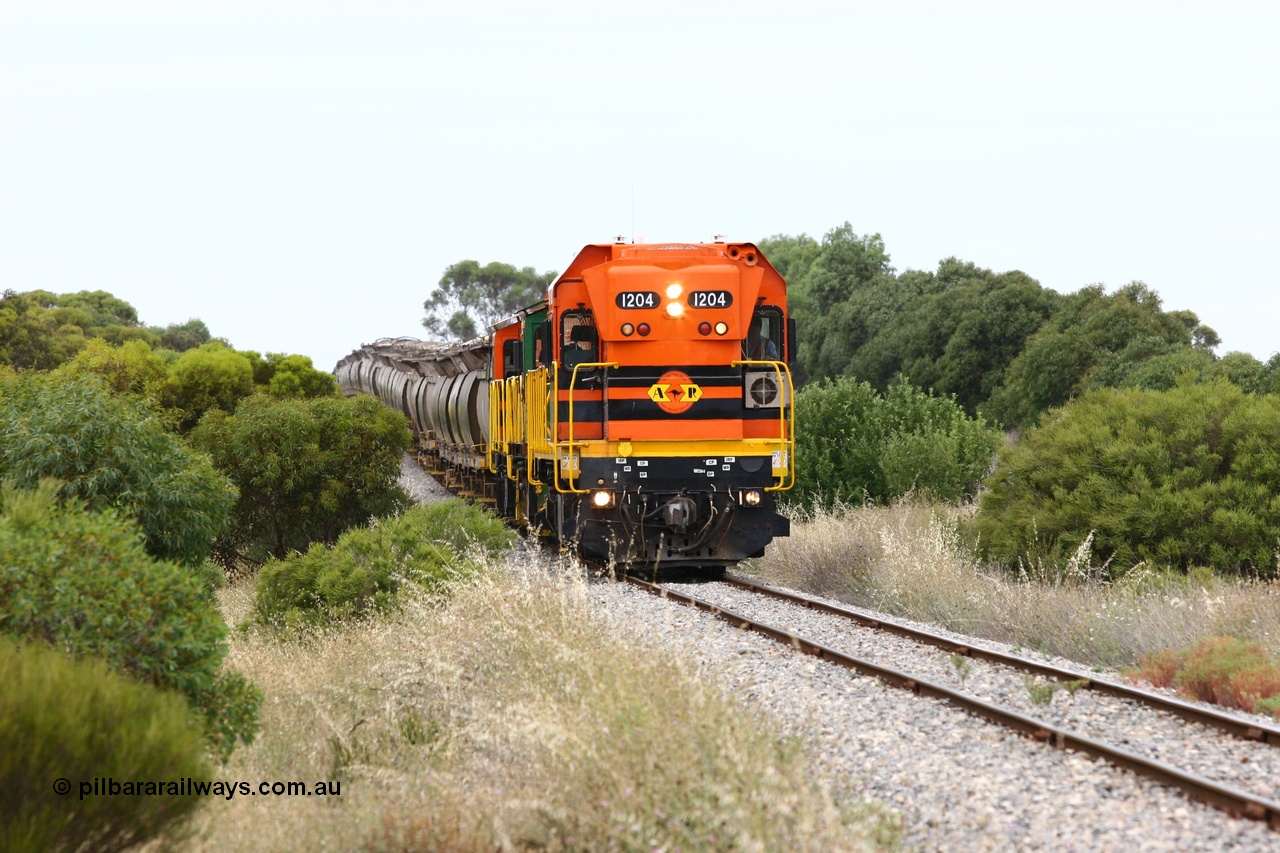 060110 2176
Near the 73 km and Cockaleechie Road grade crossing, empty grain train with ARG 1200 class unit 1204, a Clyde Engineering EMD model G12C serial 65-428, originally built for the WAGR as the final unit of fourteen A class locomotives in 1965 and sent to the Eyre Peninsula in July 2004 and two 830 class AE Goodwin built ALCo model DL531 units 842 serial 84140 ex SAR broad gauge to Eyre Peninsula in October 1987, and 851 serial 84137 new to Eyre Peninsula in 1962. [url=https://goo.gl/maps/LoznGHgHTUC2]Approx. location of image[/url].
Keywords: 1200-class;1204;Clyde-Engineering-Granville-NSW;EMD;G12C;65-428;A-class;A1514;830-class;842;851;AE-Goodwin;ALCo;DL531;84137;84140;