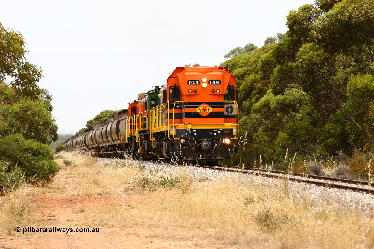 060110 2182
Near the 78 km, empty grain train with ARG 1200 class unit 1204, a Clyde Engineering EMD model G12C serial 65-428, originally built for the WAGR as the final unit of fourteen A class locomotives in 1965 and sent to the Eyre Peninsula in July 2004 and two 830 class AE Goodwin built ALCo model DL531 units 842 serial 84140 ex SAR broad gauge to Eyre Peninsula in October 1987, and 851 serial 84137 new to Eyre Peninsula in 1962. [url=https://goo.gl/maps/bAmc6CyEwC42]Approx. location of image[/url].
Keywords: 1200-class;1204;Clyde-Engineering-Granville-NSW;EMD;G12C;65-428;A-class;A1514;830-class;842;851;AE-Goodwin;ALCo;DL531;84137;84140;