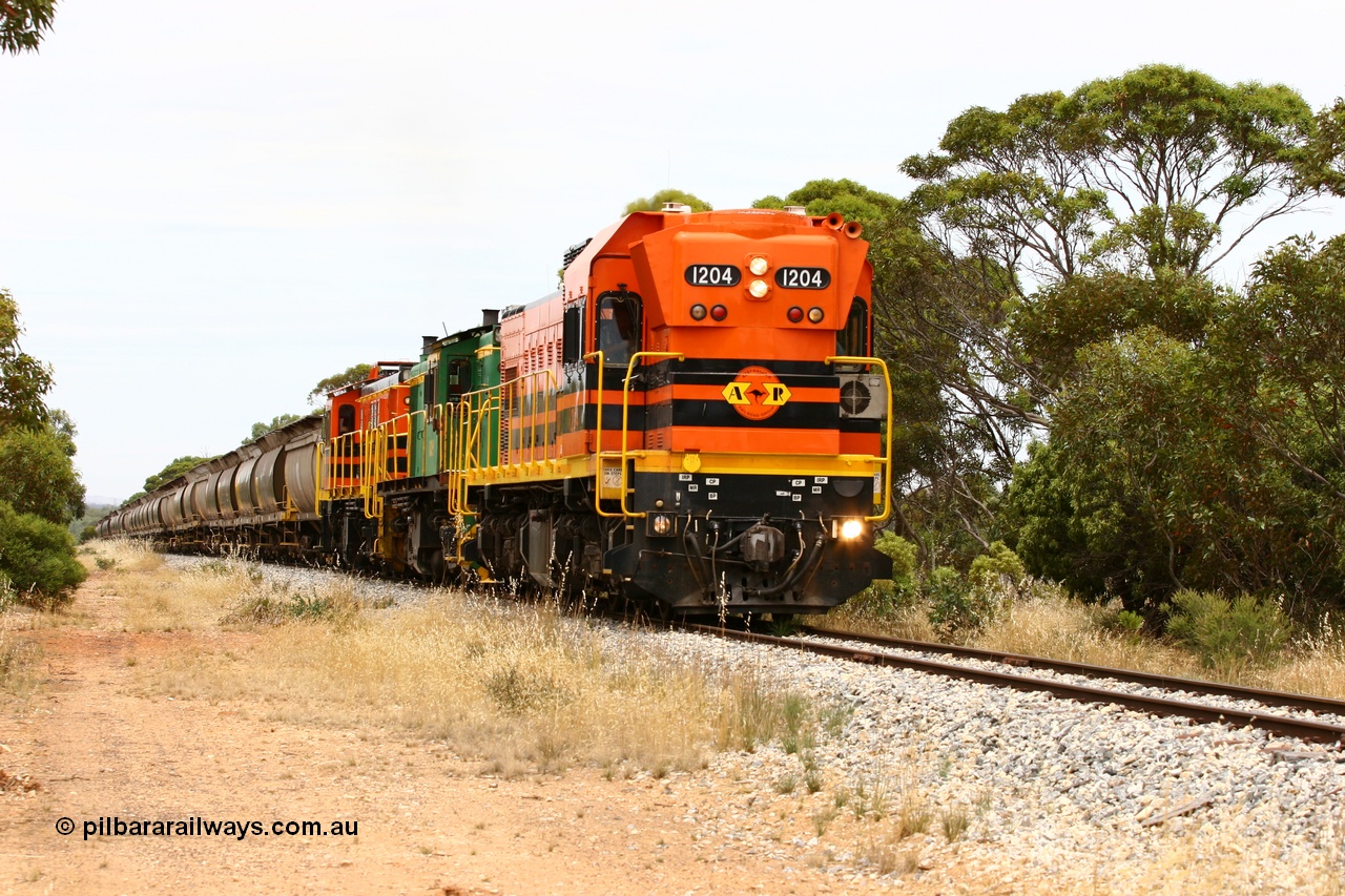 060110 2184
Near the 78 km, empty grain train with ARG 1200 class unit 1204, a Clyde Engineering EMD model G12C serial 65-428, originally built for the WAGR as the final unit of fourteen A class locomotives in 1965 and sent to the Eyre Peninsula in July 2004 and two 830 class AE Goodwin built ALCo model DL531 units 842 serial 84140 ex SAR broad gauge to Eyre Peninsula in October 1987, and 851 serial 84137 new to Eyre Peninsula in 1962. [url=https://goo.gl/maps/bAmc6CyEwC42]Approx. location of image[/url].
Keywords: 1200-class;1204;Clyde-Engineering-Granville-NSW;EMD;G12C;65-428;A-class;A1514;830-class;842;851;AE-Goodwin;ALCo;DL531;84137;84140;