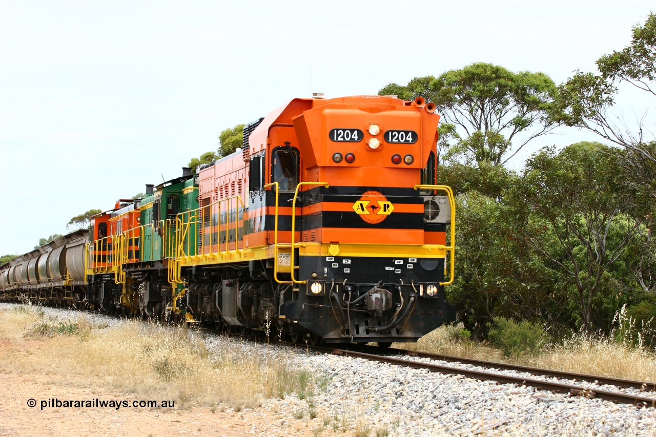 060110 2185
Near the 78 km, empty grain train with ARG 1200 class unit 1204, a Clyde Engineering EMD model G12C serial 65-428, originally built for the WAGR as the final unit of fourteen A class locomotives in 1965 and sent to the Eyre Peninsula in July 2004 and two 830 class AE Goodwin built ALCo model DL531 units 842 serial 84140 ex SAR broad gauge to Eyre Peninsula in October 1987, and 851 serial 84137 new to Eyre Peninsula in 1962. [url=https://goo.gl/maps/bAmc6CyEwC42]Approx. location of image[/url].
Keywords: 1200-class;1204;Clyde-Engineering-Granville-NSW;EMD;G12C;65-428;A-class;A1514;830-class;842;851;AE-Goodwin;ALCo;DL531;84137;84140;