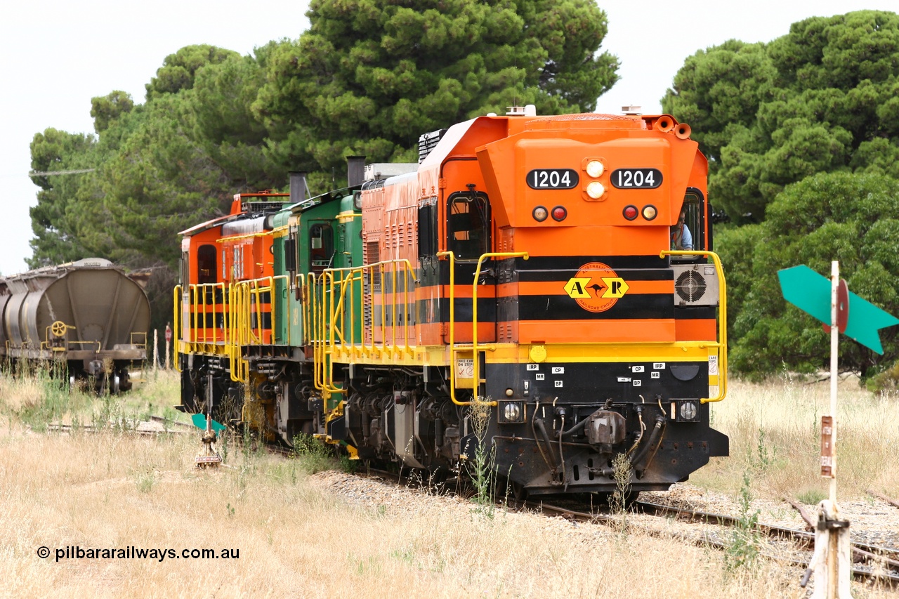 060110 2207
Yeelanna, ARG 1200 class unit 1204, a Clyde Engineering EMD model G12C serial 65-428, originally built for the WAGR as the final unit of fourteen A class locomotives in 1965 and sent to the Eyre Peninsula in July 2004 shunts back onto its train of empties on the mainline. [url=https://goo.gl/maps/1JetzWBTGAw]Approx. location of image[/url].
Keywords: 1200-class;1204;Clyde-Engineering-Granville-NSW;EMD;G12C;65-428;A-class;A1514;830-class;842;851;AE-Goodwin;ALCo;DL531;84137;84140;