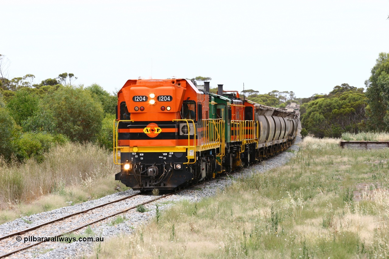 060110 2229
Karkoo, empty grain train behind ARG 1200 class unit 1204, a Clyde Engineering EMD model G12C serial 65-428, originally built for the WAGR as the final unit of fourteen A class locomotives in 1965 and sent to the Eyre Peninsula in July 2004 and two 830 class AE Goodwin built ALCo model DL531 units 842 serial 84140 ex SAR broad gauge and to Eyre Peninsula in October 1987, and 851 serial 84137 new to Eyre Peninsula in 1962. [url=https://goo.gl/maps/syz89ziXmoL2]Approx. location of image[/url].
Keywords: 1200-class;1204;Clyde-Engineering-Granville-NSW;EMD;G12C;65-428;A-class;A1514;