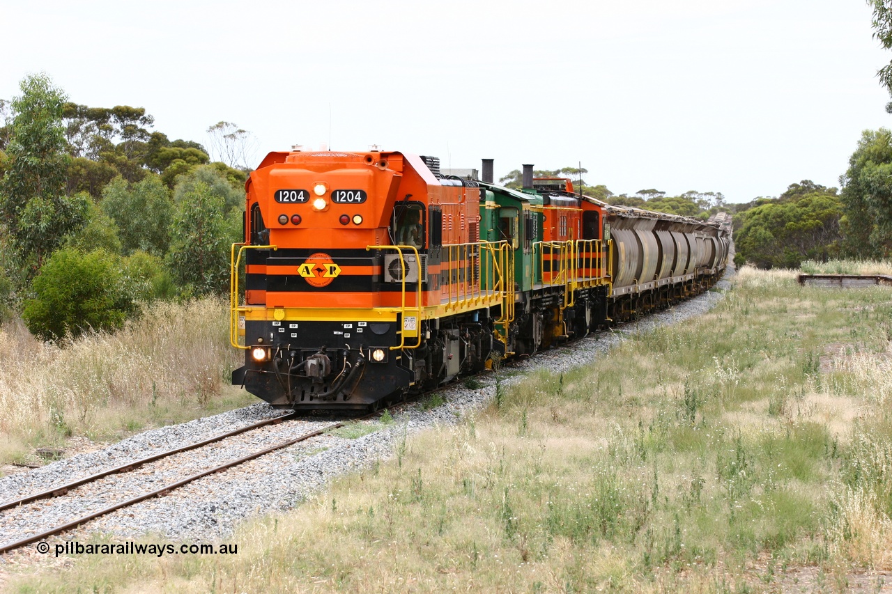 060110 2230
Karkoo, empty grain train behind ARG 1200 class unit 1204, a Clyde Engineering EMD model G12C serial 65-428, originally built for the WAGR as the final unit of fourteen A class locomotives in 1965 and sent to the Eyre Peninsula in July 2004 and two 830 class AE Goodwin built ALCo model DL531 units 842 serial 84140 ex SAR broad gauge and to Eyre Peninsula in October 1987, and 851 serial 84137 new to Eyre Peninsula in 1962. [url=https://goo.gl/maps/syz89ziXmoL2]Approx. location of image[/url].
Keywords: 1200-class;1204;Clyde-Engineering-Granville-NSW;EMD;G12C;65-428;A-class;A1514;830-class;842;851;AE-Goodwin;ALCo;DL531;84137;84140;