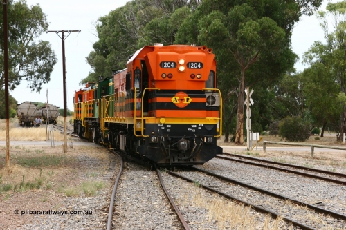 060110 2165
Cummins, view across Railway Terrace of empty grain train shunting the Cummins Bunker track to pick up empty hoppers, behind ARG 1200 class unit 1204, a Clyde Engineering EMD model G12C serial 65-428, originally built for the WAGR as the final unit of fourteen A class locomotives in 1965 and sent to the Eyre Peninsula in July 2004 and two 830 class AE Goodwin built ALCo model DL531 units 842 serial 84140 ex SAR broad gauge to Eyre Peninsula in October 1987, and 851 serial 84137 new to Eyre Peninsula in 1962. [url=https://goo.gl/maps/q5aVqSmjCP62]Approx. location of image[/url].
Keywords: 1200-class;1204;Clyde-Engineering-Granville-NSW;EMD;G12C;65-428;A-class;A1514;830-class;842;851;AE-Goodwin;ALCo;DL531;84137;84140;