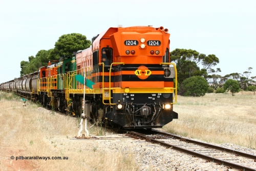 060110 2194
Yeelanna, ARG 1200 class unit 1204, a Clyde Engineering EMD model G12C serial 65-428, originally built for the WAGR as the final unit of fourteen A class locomotives in 1965 and sent to the Eyre Peninsula in July 2004 shunts forward to cut out the empty cars for the siding. [url=https://goo.gl/maps/1JetzWBTGAw]Approx. location of image[/url].
Keywords: 1200-class;1204;Clyde-Engineering-Granville-NSW;EMD;G12C;65-428;A-class;A1514;