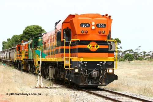 060110 2195
Yeelanna, ARG 1200 class unit 1204, a Clyde Engineering EMD model G12C serial 65-428, originally built for the WAGR as the final unit of fourteen A class locomotives in 1965 and sent to the Eyre Peninsula in July 2004 shunts forward to cut out the empty cars for the siding. [url=https://goo.gl/maps/1JetzWBTGAw]Approx. location of image[/url].
Keywords: 1200-class;1204;Clyde-Engineering-Granville-NSW;EMD;G12C;65-428;A-class;A1514;