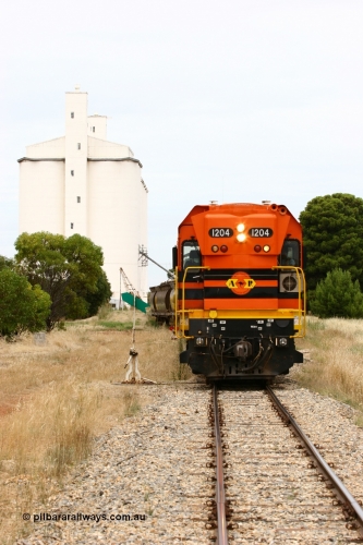060110 2198
Yeelanna, ARG 1200 class unit 1204, a Clyde Engineering EMD model G12C serial 65-428, originally built for the WAGR as the final unit of fourteen A class locomotives in 1965 and sent to the Eyre Peninsula in July 2004 shunts a rake of waggons into the grain siding. [url=https://goo.gl/maps/1JetzWBTGAw]Approx. location of image[/url].
Keywords: 1200-class;1204;Clyde-Engineering-Granville-NSW;EMD;G12C;65-428;A-class;A1514;