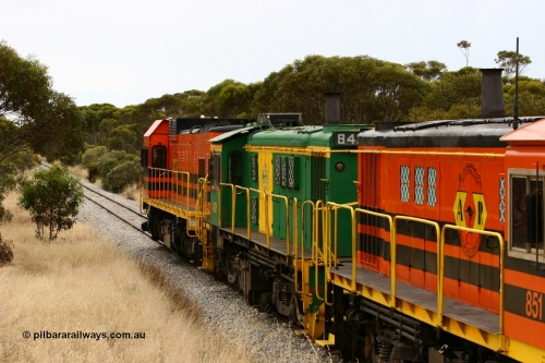 060110 2216
On the curve near the 85 km between Yeelanna and Karkoo, trailing view of 830 class AE Goodwin built ALCo model DL531 unit 842 serial 84140, ex SAR broad gauge and to Eyre Peninsula in October 1987, and ARG 1200 class unit 1204, a Clyde Engineering EMD model G12C serial 65-428, originally built for the WAGR as the final unit of fourteen A class locomotives in 1965 and sent to the Eyre Peninsula in July 2004 leads an empty grain train. [url=https://goo.gl/maps/7kwfXBE6nS12]Approx. location of image[/url].
Keywords: 1200-class;1204;Clyde-Engineering-Granville-NSW;EMD;G12C;65-428;A-class;A1514;830-class;842;AE-Goodwin;ALCo;DL531;84137;