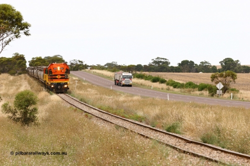 060110 2218
At the Procter Rd grade crossing about halfway between Yeelanna and Karkoo, empty grain train behind ARG 1200 class unit 1204, a Clyde Engineering EMD model G12C serial 65-428, originally built for the WAGR as the final unit of fourteen A class locomotives in 1965 and sent to the Eyre Peninsula in July 2004 and two 830 class AE Goodwin built ALCo model DL531 units with the road competition from a Llewelyn Transport road train with a Freightliner prime mover. [url=https://goo.gl/maps/DzBHRaUezTF2]Approx. location of image[/url].
Keywords: 1200-class;1204;Clyde-Engineering-Granville-NSW;EMD;G12C;65-428;A-class;A1514;