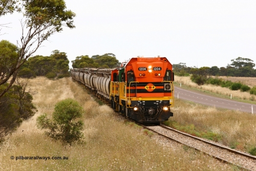 060110 2221
At the Procter Rd grade crossing about halfway between Yeelanna and Karkoo, empty grain train behind ARG 1200 class unit 1204, a Clyde Engineering EMD model G12C serial 65-428, originally built for the WAGR as the final unit of fourteen A class locomotives in 1965 and sent to the Eyre Peninsula in July 2004 and two 830 class AE Goodwin built ALCo model DL531 units 842 serial 84140 ex SAR broad gauge and to Eyre Peninsula in October 1987, and 851 serial 84137 new to Eyre Peninsula in 1962. [url=https://goo.gl/maps/DzBHRaUezTF2]Approx. location of image[/url].
Keywords: 1200-class;1204;Clyde-Engineering-Granville-NSW;EMD;G12C;65-428;A-class;A1514;