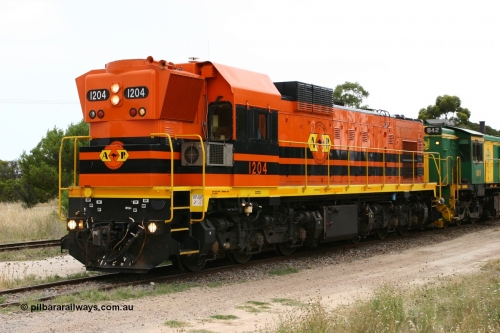 060110 2238
Lock, ARG 1200 class unit 1204, a Clyde Engineering EMD model G12C serial 65-428, originally built for the WAGR as the final unit of fourteen A class locomotives in 1965 and sent to the Eyre Peninsula in July 2004. [url=https://goo.gl/maps/epTNTP7PARy]Approx. location of image[/url].
Keywords: 1200-class;1204;Clyde-Engineering-Granville-NSW;EMD;G12C;65-428;A-class;A1514;