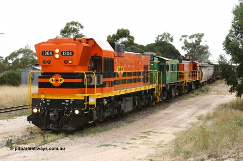 060110 2241
Lock, grain train loading underway behind ARG 1200 class unit 1204, a Clyde Engineering EMD model G12C serial 65-428, originally built for the WAGR as the final unit of fourteen A class locomotives in 1965 and sent to the Eyre Peninsula in July 2004 and two 830 class AE Goodwin built ALCo model DL531 units 842 serial 84140 ex SAR broad gauge and to Eyre Peninsula in October 1987, and 851 serial 84137 new to Eyre Peninsula in 1962. [url=https://goo.gl/maps/epTNTP7PARy]Approx. location of image[/url].
Keywords: 1200-class;1204;Clyde-Engineering-Granville-NSW;EMD;G12C;65-428;A-class;A1514;