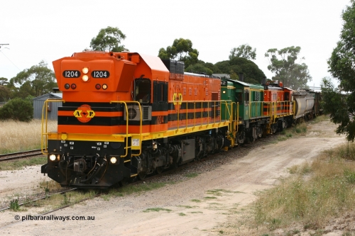 060110 2242
Lock, grain train loading underway behind ARG 1200 class unit 1204, a Clyde Engineering EMD model G12C serial 65-428, originally built for the WAGR as the final unit of fourteen A class locomotives in 1965 and sent to the Eyre Peninsula in July 2004 and two 830 class AE Goodwin built ALCo model DL531 units 842 serial 84140 ex SAR broad gauge and to Eyre Peninsula in October 1987, and 851 serial 84137 new to Eyre Peninsula in 1962. [url=https://goo.gl/maps/epTNTP7PARy]Approx. location of image[/url].
Keywords: 1200-class;1204;Clyde-Engineering-Granville-NSW;EMD;G12C;65-428;A-class;A1514;