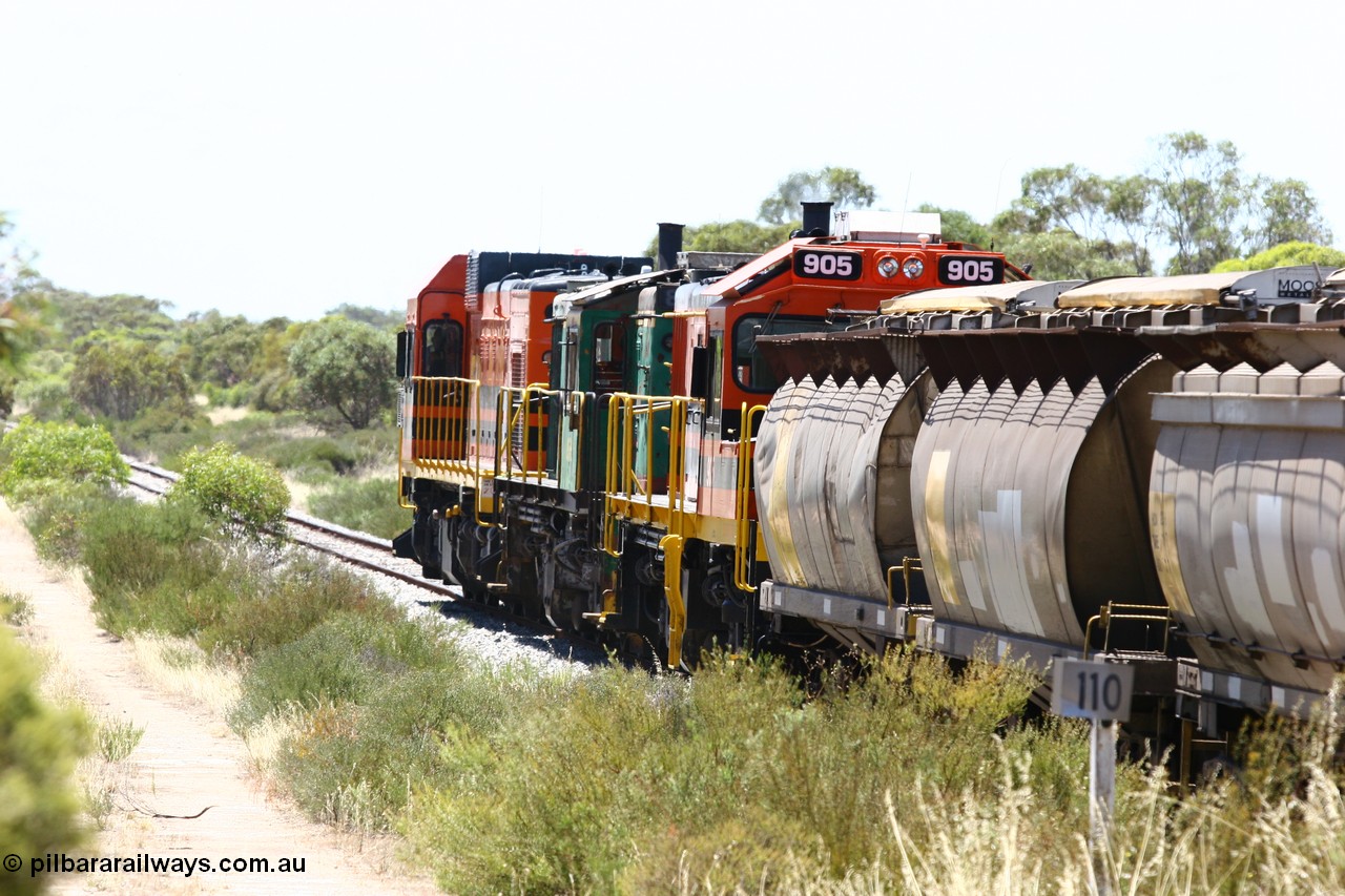 060111 2252
Tooligie, Mac's Road grade crossing at the 110 km, ARG 1200 class unit 1203, a Clyde Engineering EMD model G12C serial 65-427, one of fourteen originally built between 1960-65 for WAGR as their A class A 1513, fitted with dynamic brakes and financed by Western Mining Corporation, started working on the Eyre Peninsula in November 2004 leads an empty grain train north. 11th January 2006.
