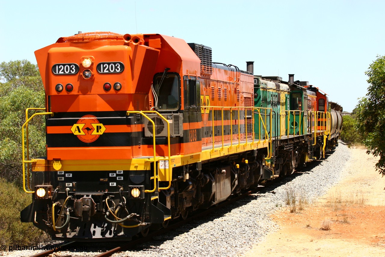 060111 2271
Tooligie, empty grain train running north behind ARG 1200 class unit 1203, a Clyde Engineering EMD model G12C serial 65-427, one of fourteen originally built between 1960-65 for WAGR as their A class A 1513, fitted with dynamic brakes and financed by Western Mining Corporation, started working on the Eyre Peninsula in November 2004. 11th January 2006.
Keywords: 1200-class;1203;Clyde-Engineering-Granville-NSW;EMD;G12C;65-427;A-class;A1513;