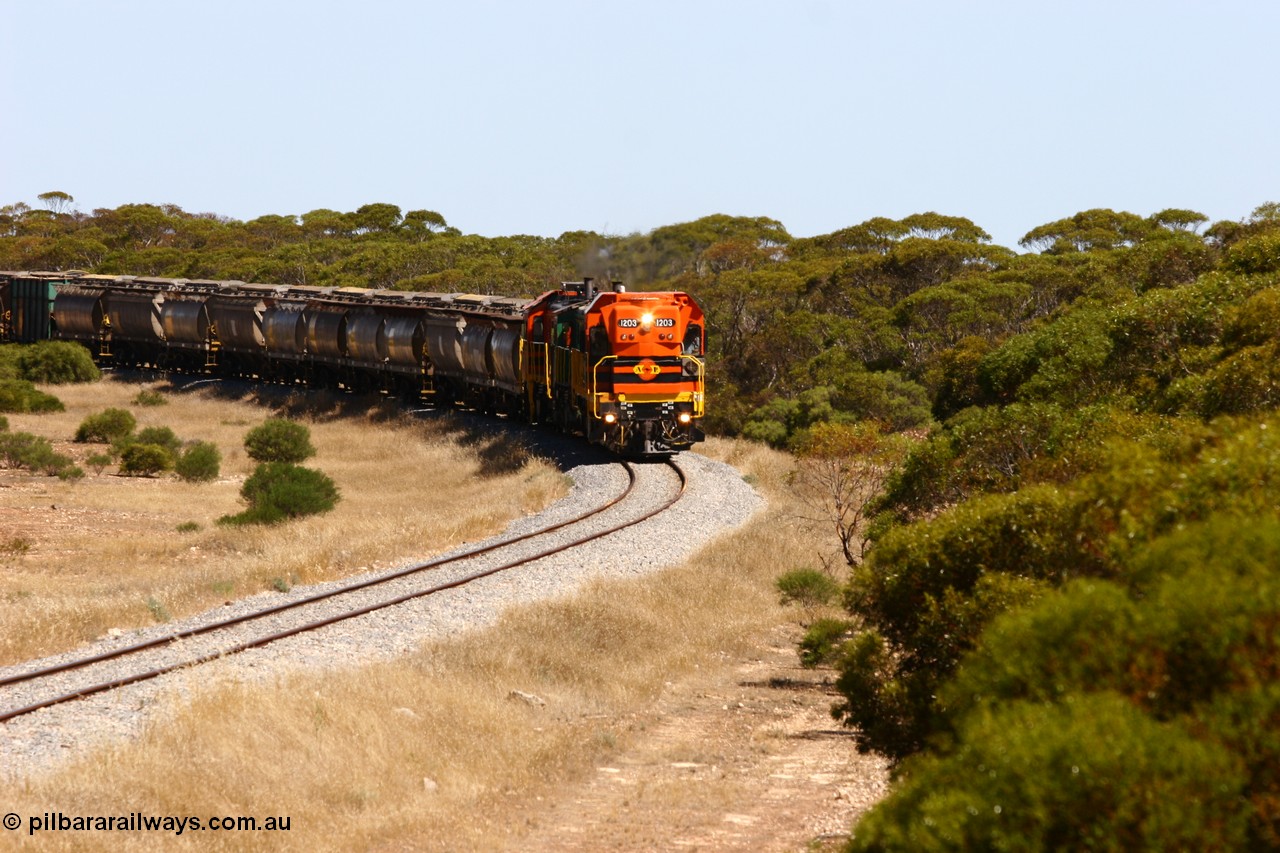 060111 2312
Nantuma, Clyde Engineering built EMD G12C model loco 1203 serial 65-427 leads two ALCo units 850 and 905 as they round the bend just north of the old station site at the 183 km. Their next shunt will be Warramboo. 11th January 2006.
Keywords: 1200-class;1203;Clyde-Engineering-Granville-NSW;EMD;G12C;65-427;A-class;A1513;