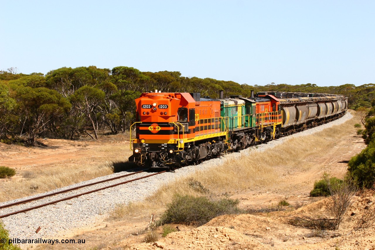 060111 2319
Nantuma, Clyde Engineering built EMD G12C model loco 1203 serial 65-427 leads two ALCo units 850 and 905 as they round the bend just north of the old station site at the 183 km. Their next shunt will be Warramboo. 11th January 2006.
Keywords: 1200-class;1203;Clyde-Engineering-Granville-NSW;EMD;G12C;65-427;A-class;A1513;