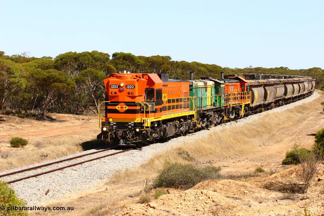 060111 2320
Nantuma, Clyde Engineering built EMD G12C model loco 1203 serial 65-427 leads two ALCo units 850 and 905 as they round the bend just north of the old station site at the 183 km. Their next shunt will be Warramboo. 11th January 2006.
Keywords: 1200-class;1203;Clyde-Engineering-Granville-NSW;EMD;G12C;65-427;A-class;A1513;