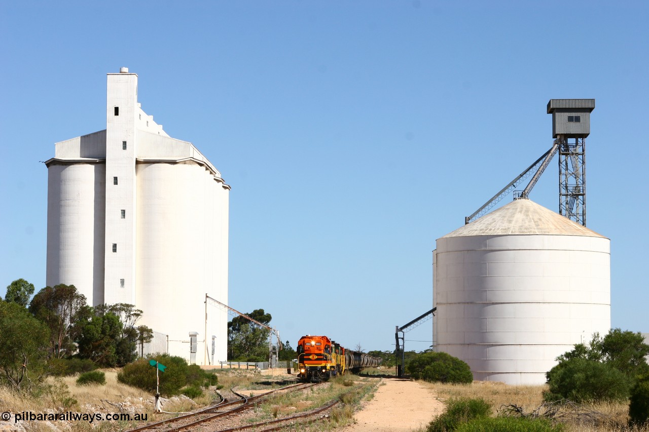 060111 2340
Kyancutta, the concrete and steel silo complexes frame ARG 1200 class unit 1203, a Clyde Engineering EMD model G12C serial 65-427, one of fourteen originally built between 1960-65 for WAGR as their A class A 1513, fitted with dynamic brakes and financed by Western Mining Corporation, started working on the Eyre Peninsula in November 2004 as it leads a north bound empty grain train. 11th January 2006.
Keywords: 1200-class;1203;Clyde-Engineering-Granville-NSW;EMD;G12C;65-427;A-class;A1513;