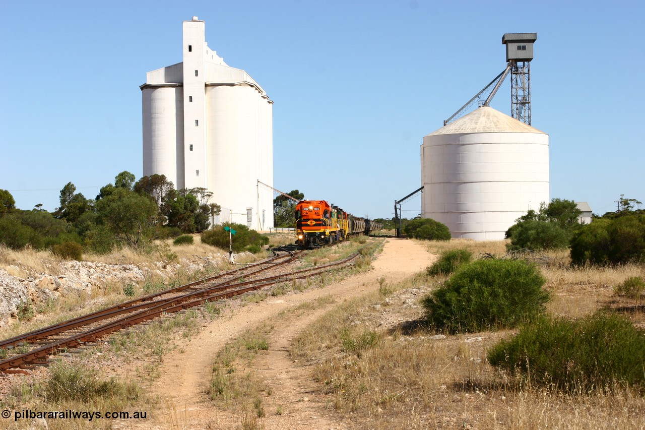 060111 2341
Kyancutta, the concrete and steel silo complexes frame ARG 1200 class unit 1203, a Clyde Engineering EMD model G12C serial 65-427, one of fourteen originally built between 1960-65 for WAGR as their A class A 1513, fitted with dynamic brakes and financed by Western Mining Corporation, started working on the Eyre Peninsula in November 2004 as it leads a north bound empty grain train. 11th January 2006.
Keywords: 1200-class;1203;Clyde-Engineering-Granville-NSW;EMD;G12C;65-427;A-class;A1513;