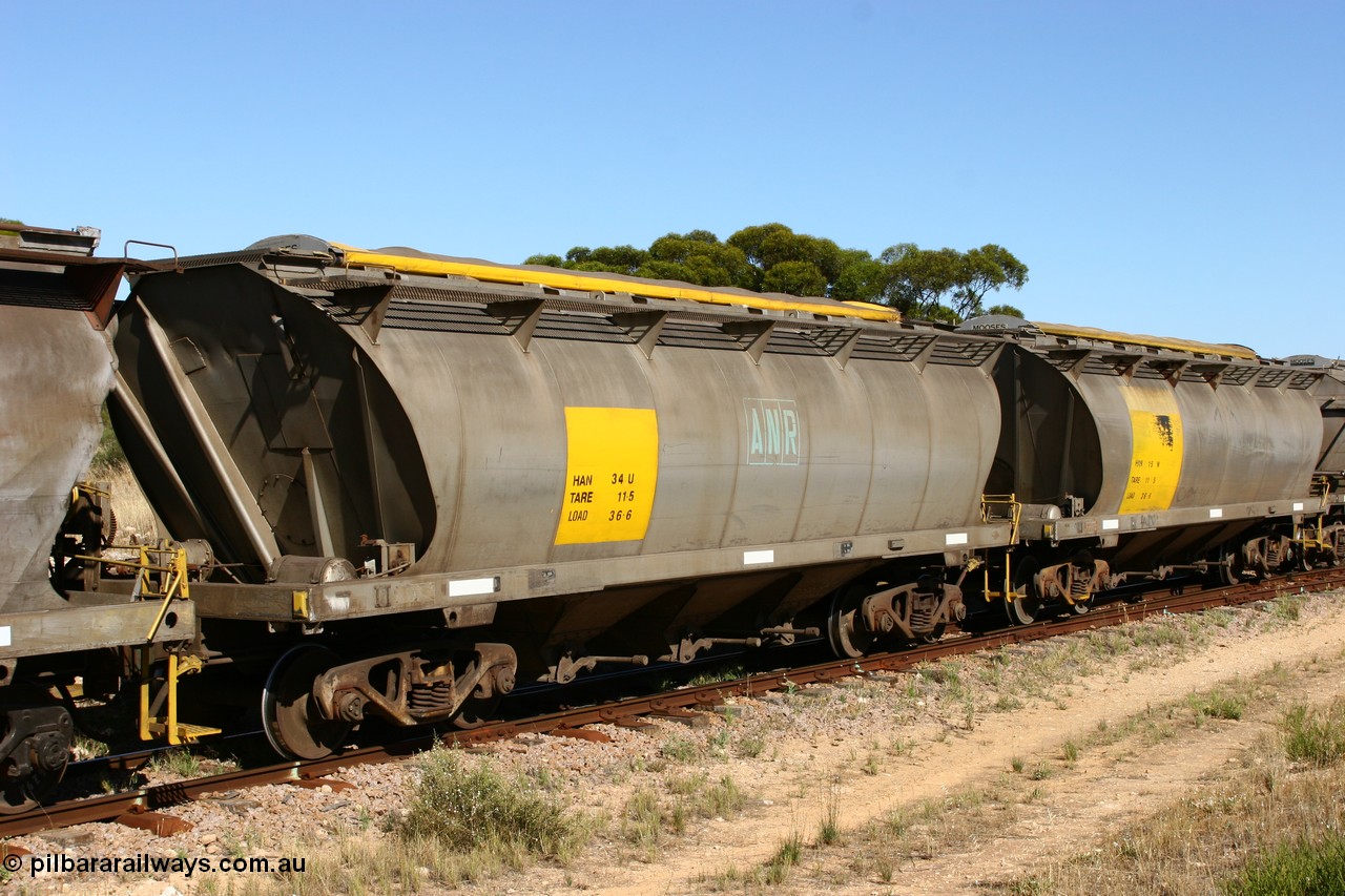 060111 2350
Kyancutta, empty grain waggons being shunted, SAR Islington Workshops built HAN type bogie wheat waggons HAN 34 with ANR logo, while HAN 15 still has the SAR logo. 11th January 2006.
Keywords: HAN-type;HAN34;1969-73/68-34;SAR-Islington-WS;