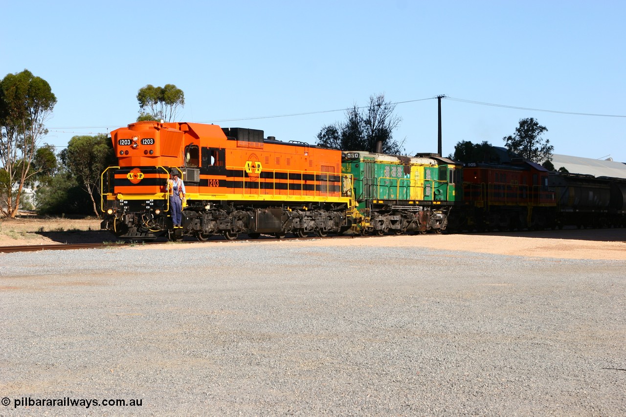 060111 2398
Wudinna, ARG 1200 class unit 1203, a Clyde Engineering EMD model G12C serial 65-427 is one of fourteen originally built between 1960-65 for WAGR as A class, A 1513, fitted with dynamic brakes and financed by Western Mining Corporation, it started working on the Eyre Peninsula in November 2004, here it and two ALCo units 850 and 905 have arrived on the grain loop and are about to run round the consist. 11th January 2006.
Keywords: 1200-class;1203;Clyde-Engineering-Granville-NSW;EMD;G12C;65-427;A-class;A1513;