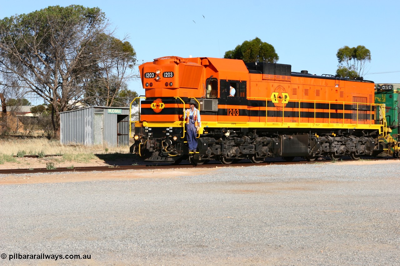 060111 2400
Wudinna, ARG 1200 class unit 1203, a Clyde Engineering EMD model G12C serial 65-427, one of fourteen originally built between 1960-65 for WAGR as their A class A 1513, fitted with dynamic brakes and financed by Western Mining Corporation, started working on the Eyre Peninsula in November 2004, shunts through the yard.
Keywords: 1200-class;1203;Clyde-Engineering-Granville-NSW;EMD;G12C;65-427;A-class;A1513;