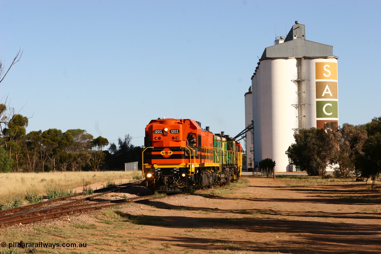 060111 2401
Wudinna, ARG 1200 class unit 1203, a Clyde Engineering EMD model G12C serial 65-427, one of fourteen originally built between 1960-65 for WAGR as their A class A 1513, fitted with dynamic brakes and financed by Western Mining Corporation, started working on the Eyre Peninsula in November 2004, shunts through the yard.
Keywords: 1200-class;1203;Clyde-Engineering-Granville-NSW;EMD;G12C;65-427;A-class;A1513;