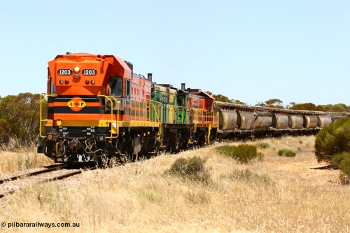 060111 2284
Murdinga, rounding the curve before entering the station environs empty grain train running north behind ARG 1200 class unit 1203, a Clyde Engineering EMD model G12C serial 65-427, one of fourteen originally built between 1960-65 for WAGR as their A class A 1513, fitted with dynamic brakes and financed by Western Mining Corporation, started working on the Eyre Peninsula in November 2004. 11th January 2006.
Keywords: 1200-class;1203;Clyde-Engineering-Granville-NSW;EMD;G12C;65-427;A-class;A1513;