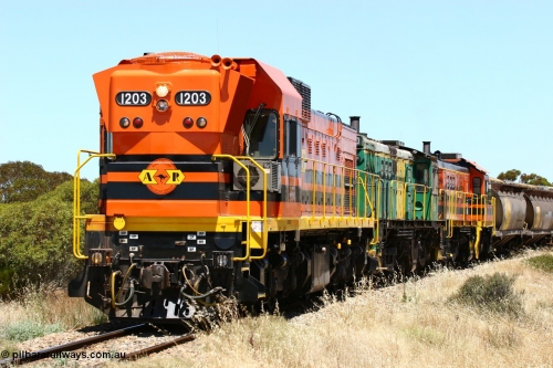 060111 2285
Murdinga, rounding the curve before entering the station environs empty grain train running north behind ARG 1200 class unit 1203, a Clyde Engineering EMD model G12C serial 65-427, one of fourteen originally built between 1960-65 for WAGR as their A class A 1513, fitted with dynamic brakes and financed by Western Mining Corporation, started working on the Eyre Peninsula in November 2004. 11th January 2006.
Keywords: 1200-class;1203;Clyde-Engineering-Granville-NSW;EMD;G12C;65-427;A-class;A1513;