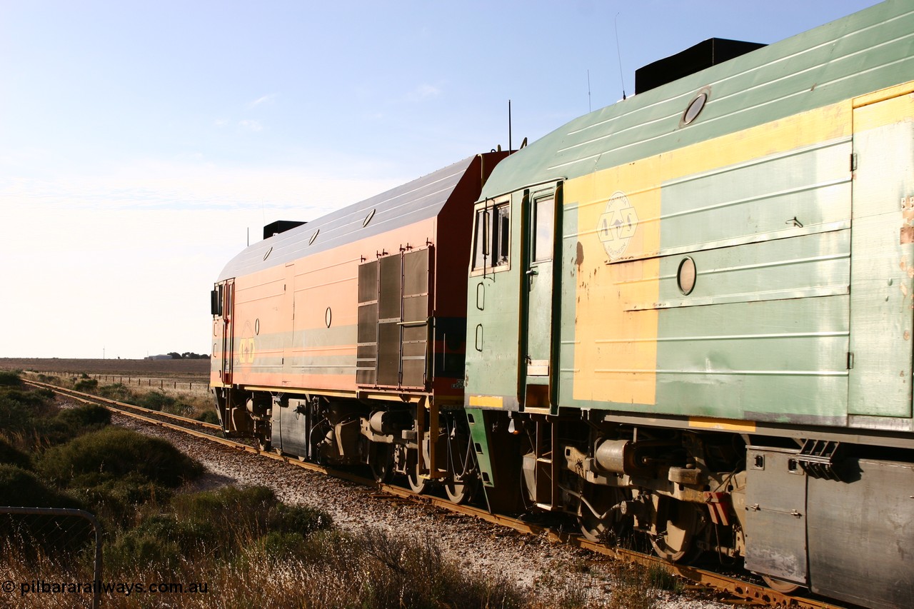 060113 2423
Ceduna, loaded gypsum train 6DD2 stirs up the dust behind the triple Clyde Engineering EMD JL22C model 1600 / NJ class combination of 1604 serial 71-731 and originally NJ 4, NJ 3 serial 71-730 and 1601 serial 71-728 class leader NJ 1, all three units started on the Central Australia Railway in 1971 and were transferred to the Eyre Peninsula in 1981. 08:10 AM on the Friday the 13th January 2006.
Keywords: 1600-class;1604;71-731;Clyde-Engineering-Granville-NSW;EMD;JL22C;NJ-class;NJ4;