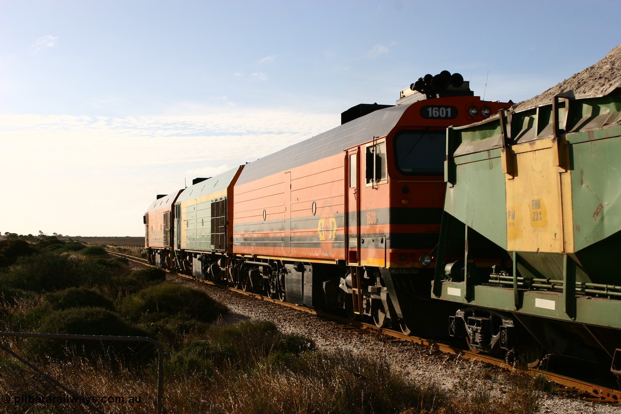 060113 2425
Ceduna, class leader of the NJ and now 1600 class 1601 and formally NJ 1 'Ben Chifley', a Clyde Engineering EMD JL22C model serial 71-728, built in 1971 at Clyde's Granville NSW workshops, started out on the Central Australia Railway for the Commonwealth Railways before being transferred to the Eyre Peninsula system in 1981, in current owners livery.
Keywords: 1600-class;1601;71-728;Clyde-Engineering-Granville-NSW;EMD;JL22C;NJ-class;NJ1;