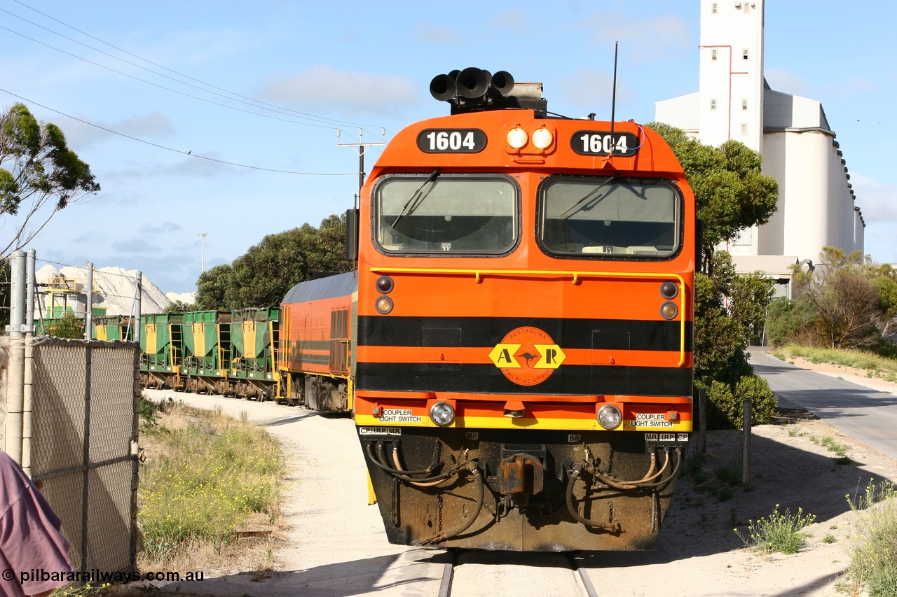 060113 2439
Thevenard, at the Gypsum Resources Australian (GRA) gypsum unloading site, 1604 leads a triple consist of Clyde Engineering EMD JL22C model 1600 / NJ class combination of 1604 serial 71-731 and originally NJ 4, NJ 3 serial 71-730 and 1601 serial 71-728 class leader NJ 1, all three units started on the Central Australia Railway in 1971 and were transferred to the Eyre Peninsula in 1981. 1604 and 1601 both renumbered in 2004. Friday 13th January 2006.
Keywords: 1600-class;1604;Clyde-Engineering-Granville-NSW;EMD;JL22C;71-731;NJ-class;NJ4;