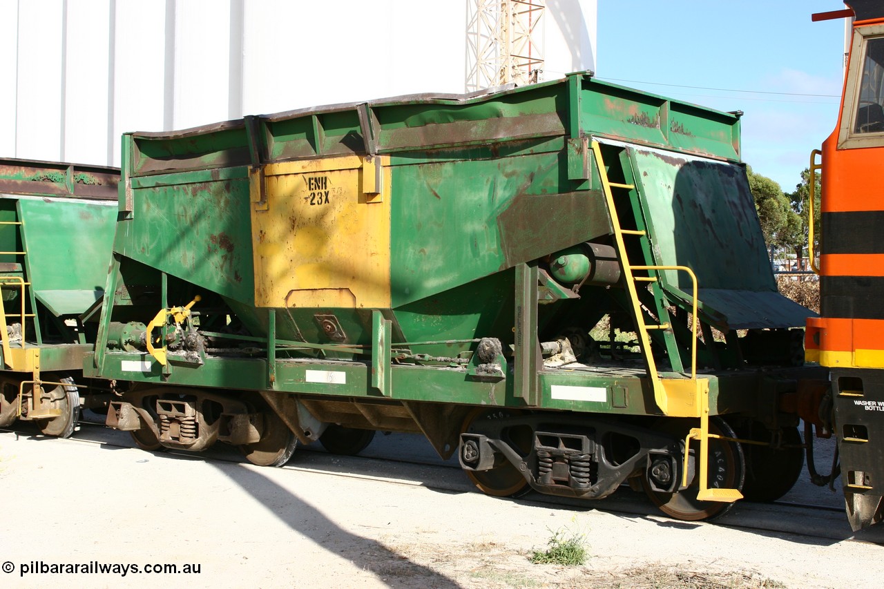 060113 2450
Thevenard, originally one of sixty two Kinki Sharyo built NH type waggons for the NAR in 1966 as NH 923, and recoded to ENH type ENH 23 in 1985, with hungry boards and access ladder intact. Exiting the [url=https://goo.gl/maps/5bEKt]Waratah Gypsum unloader[/url] and crossing Innes Avenue en route into the yard. 13th January 2006.
Keywords: ENH-type;ENH23;Kinki-Sharyo-Japan;NH-type;NH923;