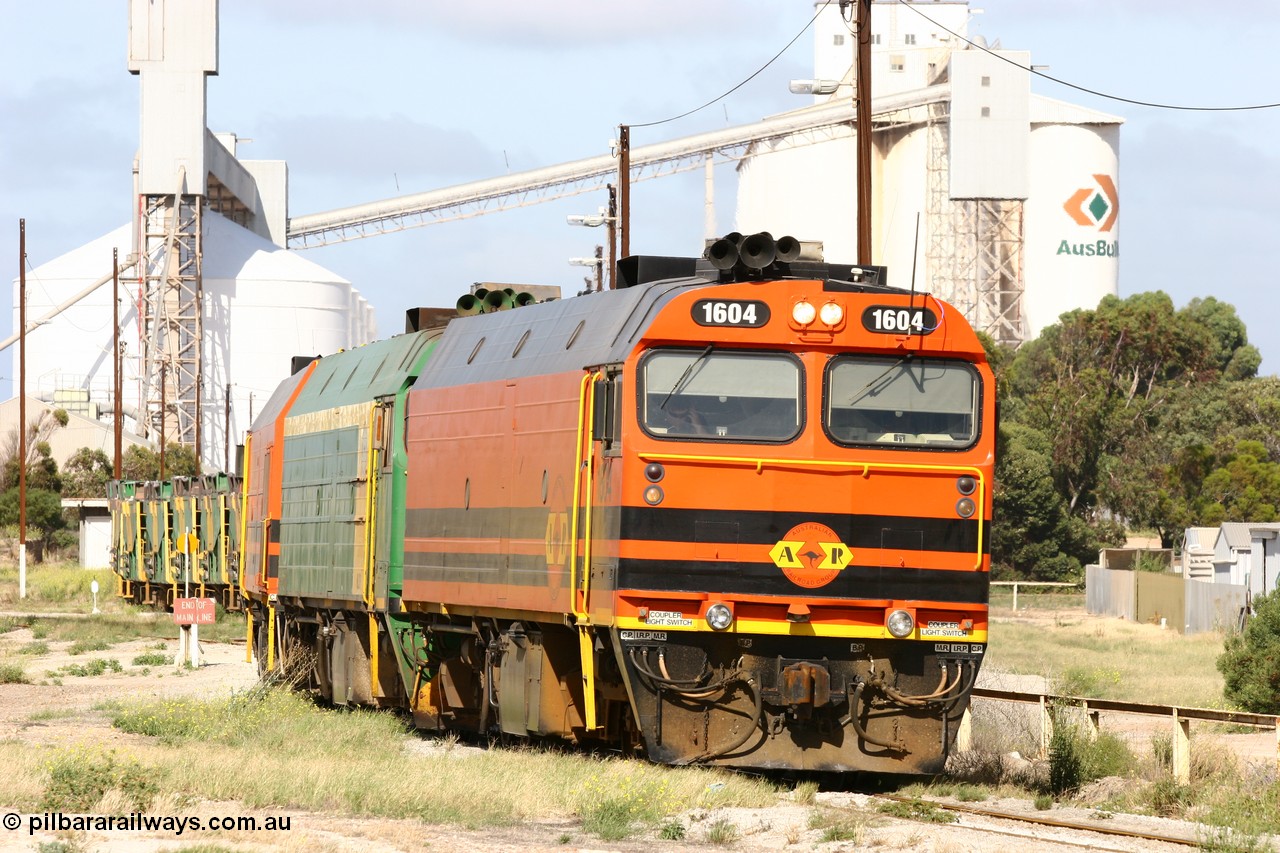 060113 2469
Thevenard, narrow gauge loco 1604 departs the yard with empty train 6DD3, 1604 leads a triple consist of Clyde Engineering built EMD JL22C model 1600 / NJ class combination of 1604 serial 71-731 and originally NJ 4, NJ 3 serial 71-730 and 1601 serial 71-728 the original class leader NJ 1, all three units started on the Central Australia Railway in 1971 and were transferred to the Eyre Peninsula in 1981. 1604 and 1601 both renumbered in 2004. 13th January 2006.
Keywords: 1600-class;1604;Clyde-Engineering-Granville-NSW;EMD;JL22C;71-731;NJ-class;NJ4;