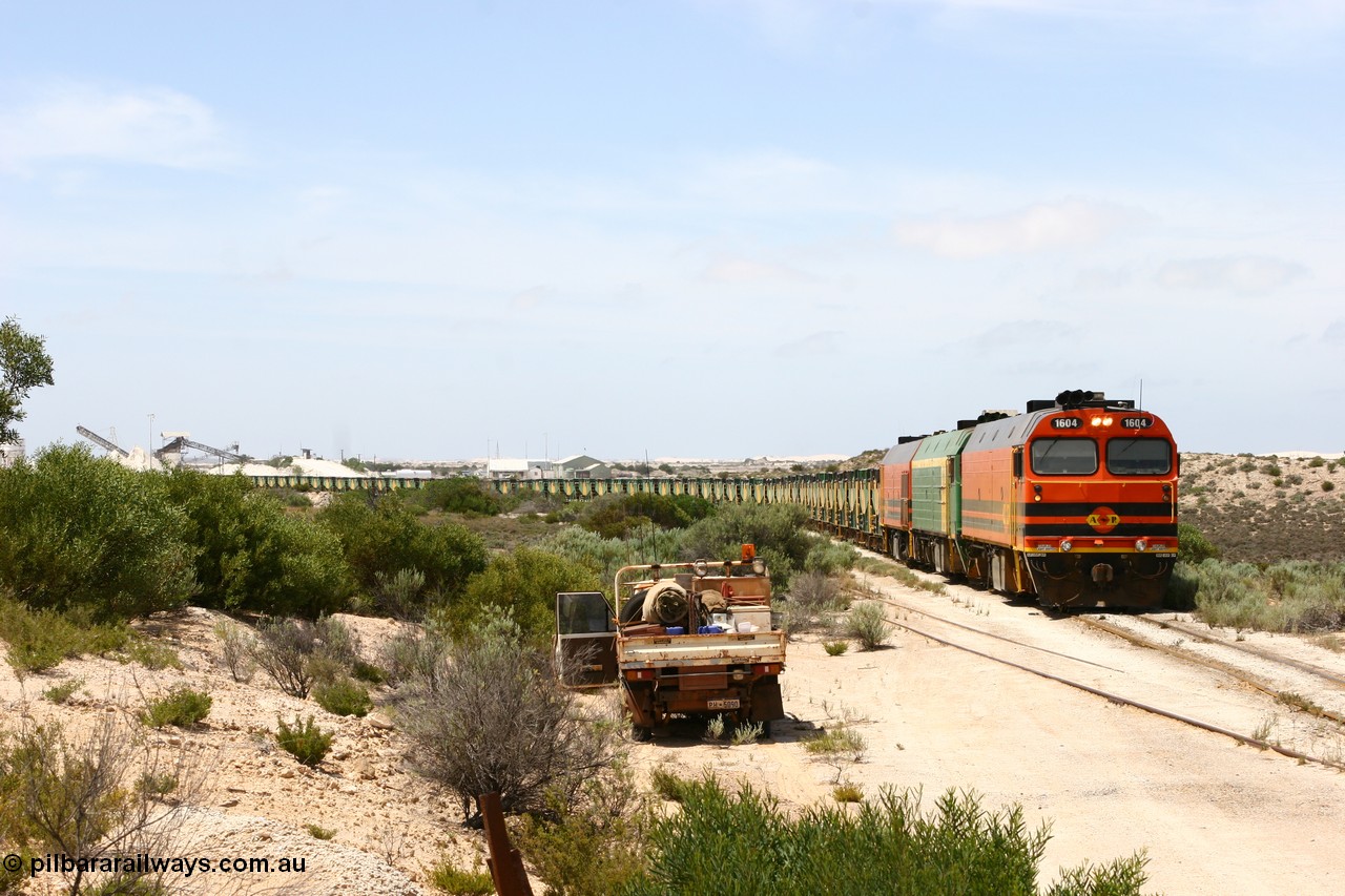 060113 2485
Kevin, ARG 1600 class narrow gauge loco 1604 a Clyde Engineering built EMD model JL22C serial 71-731, originally built for the Central Australia Railway in 1971, transferred to the Eyre Peninsula in 1981 arrives with empty gypsum train 6DD3. 13th January 2006.
Keywords: 1600-class;1604;Clyde-Engineering-Granville-NSW;EMD;JL22C;71-731;NJ-class;NJ4;