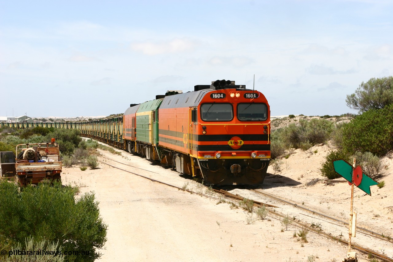 060113 2486
Kevin, ARG 1600 class narrow gauge loco 1604 a Clyde Engineering built EMD model JL22C serial 71-731, originally built for the Central Australia Railway in 1971, transferred to the Eyre Peninsula in 1981 arrives with empty gypsum train 6DD3. 13th January 2006.
Keywords: 1600-class;1604;Clyde-Engineering-Granville-NSW;EMD;JL22C;71-731;NJ-class;NJ4;