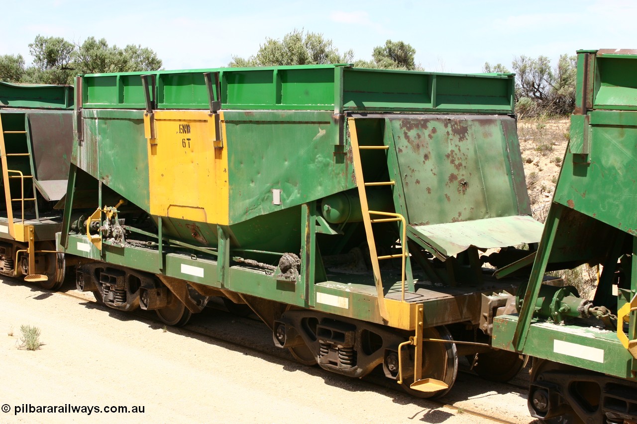 060113 2495
Kevin, originally one of sixty two Kinki Sharyo built NH type for the NAR in 1966, now coded ENH type ENH 6 and with new hungry boards fitted and access ladder still intact. Empty train 6DD3 on the [url=https://goo.gl/maps/jZAuZ]stub of the now closed line to Penong[/url].
Keywords: ENH-type;ENH6;Kinki-Sharyo-Japan;NH-type;NH906;