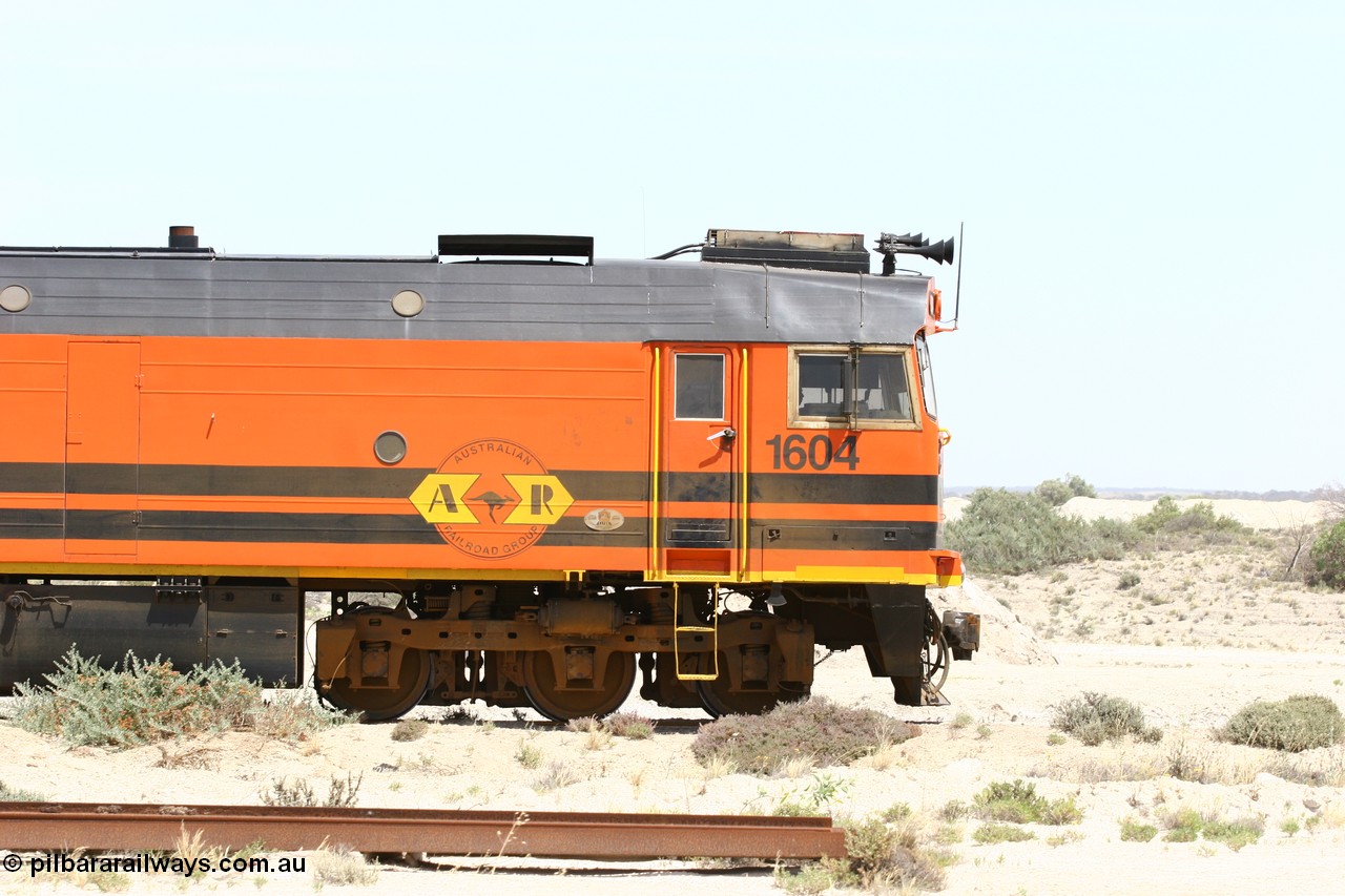 060113 2508
Kevin, cab side view of 1604 a Clyde Engineering built EMD JL22C model serial 71-731, originally coded NJ class NJ 4 and built for the Central Australia Railway in 1971, transferred to the Eyre Peninsula in 1981 arrives with empty gypsum train 6DD3. 13th January 2006.
Keywords: 1600-class;1604;71-731;Clyde-Engineering-Granville-NSW;EMD;JL22C;NJ-class;NJ4;