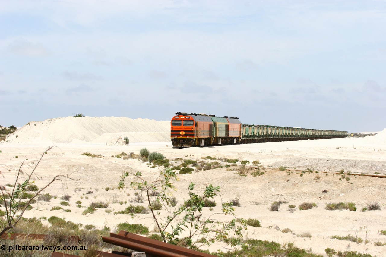 060113 2520
Kevin, empty train 6DD3 is on the west leg of the triangle as it prepares to pull forward and head south towards original gypsum loading siding to continue the reversing process. 13th January 2006.
Keywords: 1600-class;1604;71-731;Clyde-Engineering-Granville-NSW;EMD;JL22C;NJ-class;NJ4;