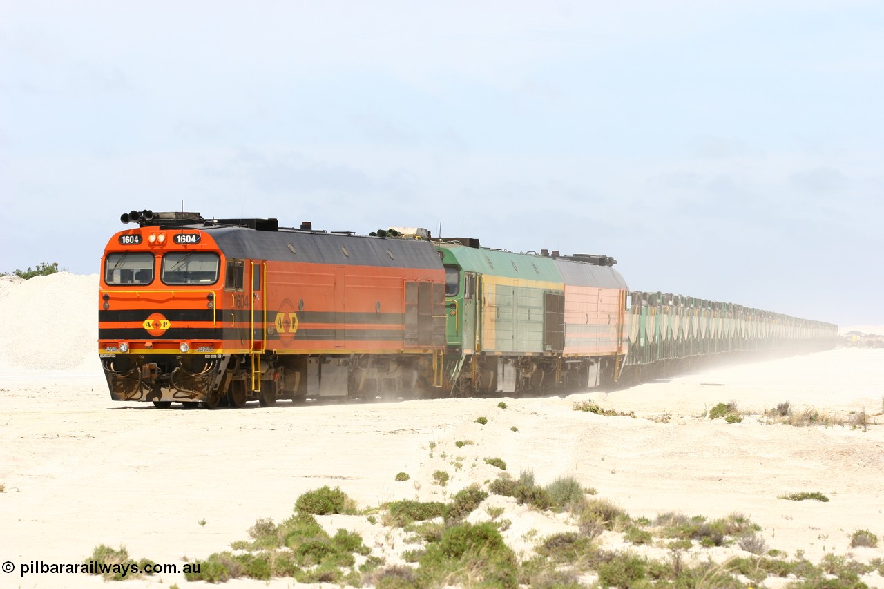 060113 2522
Kevin, empty train 6DD3 is heading onto the south leg and original gypsum loading siding to continue the reversing process. 13th January 2006.
Keywords: 1600-class;1604;71-731;Clyde-Engineering-Granville-NSW;EMD;JL22C;NJ-class;NJ4;