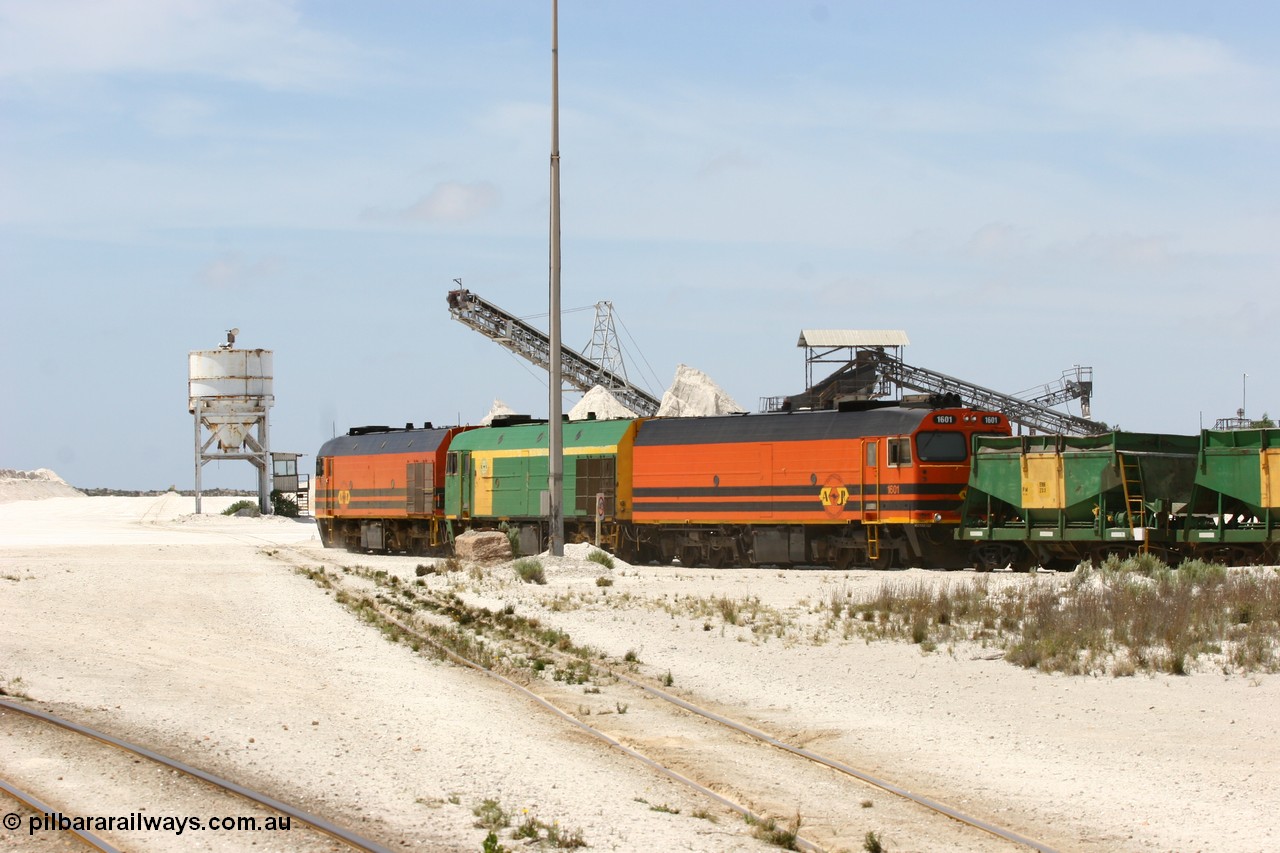 060113 2529
Kevin, empty train 6DD3 is heading onto the south leg with some of the gypsum plant behind the train and a set of original loading bins gypsum loading siding to continue the reversing process. 13th January 2006.
Keywords: 1600-class;1601;71-728;Clyde-Engineering-Granville-NSW;EMD;JL22C;NJ-class;NJ1;