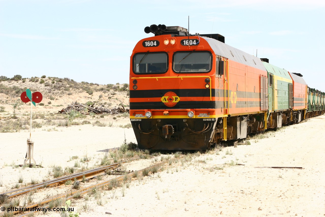 060113 2541
Kevin, narrow gauge locos 1604, NJ 3 and 1601 sit on the mainline to Penong, having reversed train 6DD3 on the Kevin triangle 1600 class unit 1604 in Australian Railroad Group livery a Clyde Engineering built EMD JL22C model serial 71-731, originally built as NJ class NJ 4 and built for the Central Australia Railway in 1971, transferred to the Eyre Peninsula in 1981. 13th January 2006.
Keywords: 1600-class;1604;Clyde-Engineering-Granville-NSW;EMD;JL22C;71-731;NJ-class;NJ4;