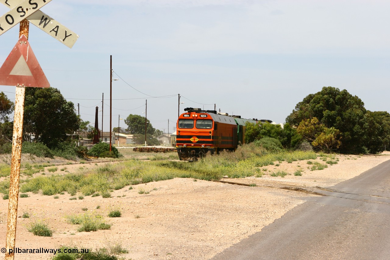 060113 2559
Thevenard, loaded gypsum train 6DD4 snakes into the yard behind 1600 class unit 1604 in Australian Railroad Group livery a Clyde Engineering built EMD JL22C model serial 71-731, originally built as NJ class NJ 4. [url=https://goo.gl/maps/9g3QoE4iaiDjqyta9]Bergmann Dr grade crossing[/url]. 13th January 2006.
Keywords: 1600-class;1604;Clyde-Engineering-Granville-NSW;EMD;JL22C;71-731;NJ-class;NJ4;