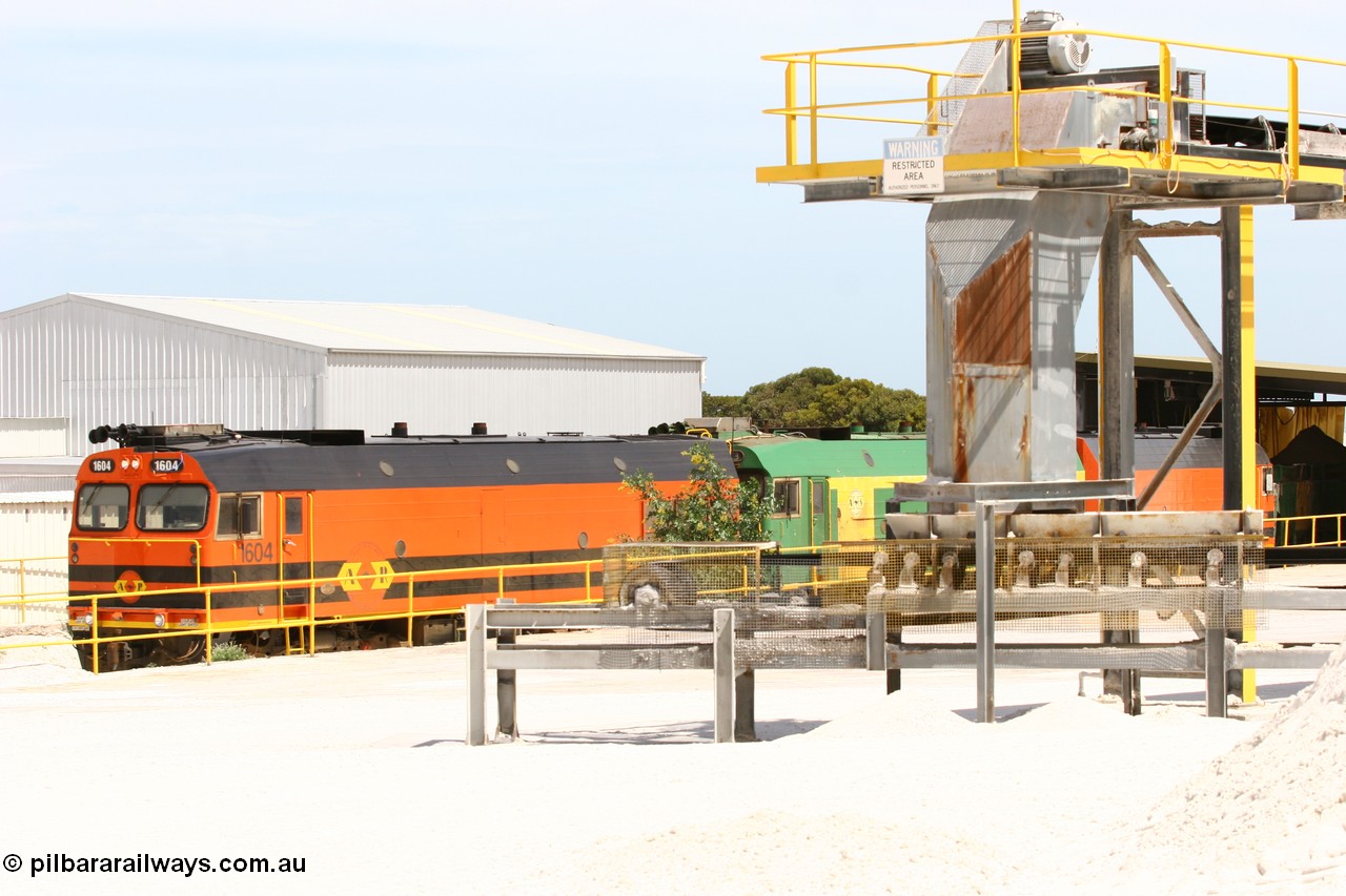 060113 2570
Thevenard, a view of the conveyors and unloading shed of Gypsum Resources Australia (GRA) plant as train 6DD4 commences unloading. 13th January 2006.
Keywords: 1600-class;1604;Clyde-Engineering-Granville-NSW;EMD;JL22C;71-731;NJ-class;NJ4;