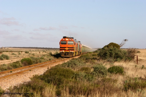 060113 2415
Ceduna, loaded gypsum train 6DD2 powers along the grades outside of town behind the triple 1600 / NJ class combination of 1604, NJ 3 and 1601 at 08:10 AM on the Friday the January 13, 2006.
Keywords: 1600-class;1604;Clyde-Engineering-Granville-NSW;EMD;JL22C;71-731;NJ-class;NJ4;