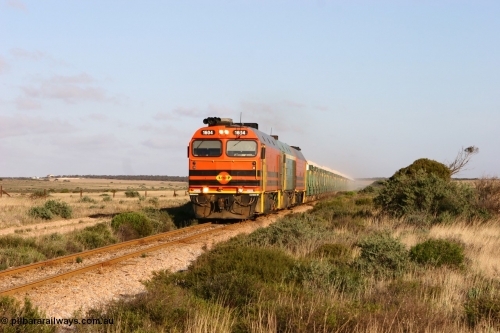 060113 2416
Ceduna, loaded gypsum train 6DD2 powers along the grades outside of town behind the triple 1600 / NJ class combination of 1604, NJ 3 and 1601 at 08:10 AM on the Friday the January 13, 2006.
Keywords: 1600-class;1604;Clyde-Engineering-Granville-NSW;EMD;JL22C;71-731;NJ-class;NJ4;