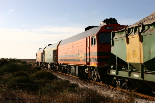060113 2425
Ceduna, class leader of the NJ and now 1600 class 1601 and formally NJ 1 'Ben Chifley', a Clyde Engineering EMD JL22C model serial 71-728, built in 1971 at Clyde's Granville NSW workshops, started out on the Central Australia Railway for the Commonwealth Railways before being transferred to the Eyre Peninsula system in 1981, in current owners livery.
Keywords: 1600-class;1601;Clyde-Engineering-Granville-NSW;EMD;JL22C;71-728;NJ-class;NJ1;
