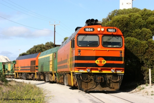 060113 2436
Thevenard, at the Gypsum Resources Australian (GRA) gypsum unloading site, 1604 leads a triple consist of Clyde Engineering EMD JL22C model 1600 / NJ class combination of 1604 serial 71-731 and originally NJ 4, NJ 3 serial 71-730 and 1601 serial 71-728 class leader NJ 1, all three units started on the Central Australia Railway in 1971 and were transferred to the Eyre Peninsula in 1981. 1604 and 1601 both renumbered in 2004. Friday January 13, 2006.
Keywords: 1600-class;1604;Clyde-Engineering-Granville-NSW;EMD;JL22C;71-731;NJ-class;NJ4;