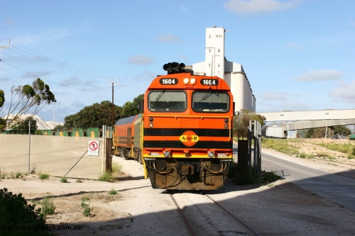 060113 2441
Thevenard, at the Gypsum Resources Australian (GRA) gypsum unloading site, 1604 leads a triple consist of Clyde Engineering EMD JL22C model 1600 / NJ class combination of 1604 serial 71-731 and originally NJ 4, NJ 3 serial 71-730 and 1601 serial 71-728 class leader NJ 1, all three units started on the Central Australia Railway in 1971 and were transferred to the Eyre Peninsula in 1981. 1604 and 1601 both renumbered in 2004. Friday January 13, 2006.
Keywords: 1600-class;1604;Clyde-Engineering-Granville-NSW;EMD;JL22C;71-731;NJ-class;NJ4;